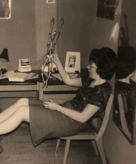 Merrilyn playing with a skelaton (1965)